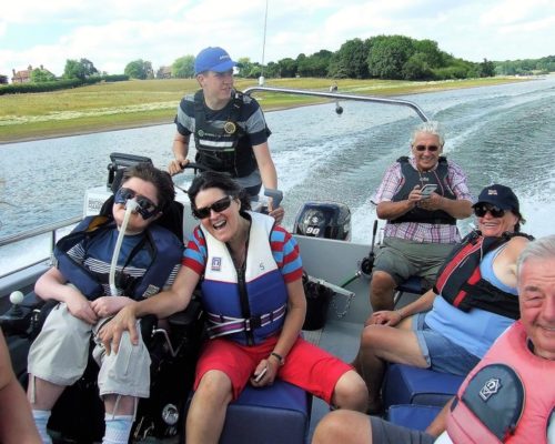 Group of people riding on a speed boat